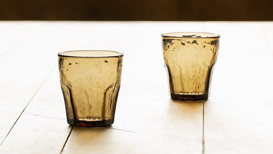 Why You Should Use Tumblers Instead Of Bottles On Dining Table