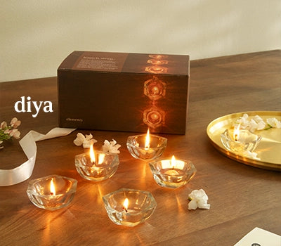 Glass, cow dung and terracotta Diyas