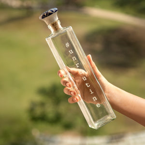 Square glass water bottle with ceramic stopper