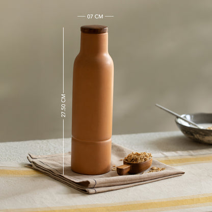 terracotta bottle with wooden lid