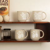 Pear embossed ceramic mug set of 2