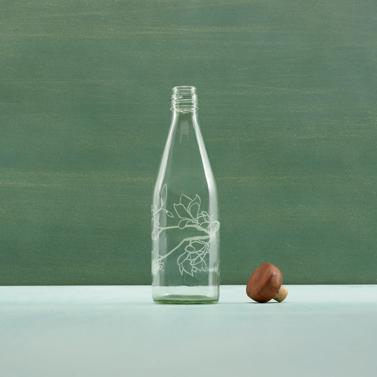magnolia glass water bottle with wooden stopper - ellementry