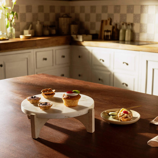 white marble cake stand with wooden base - ellementry