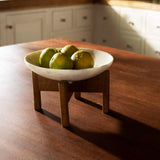 white marble bowl with wooden stand - ellementry