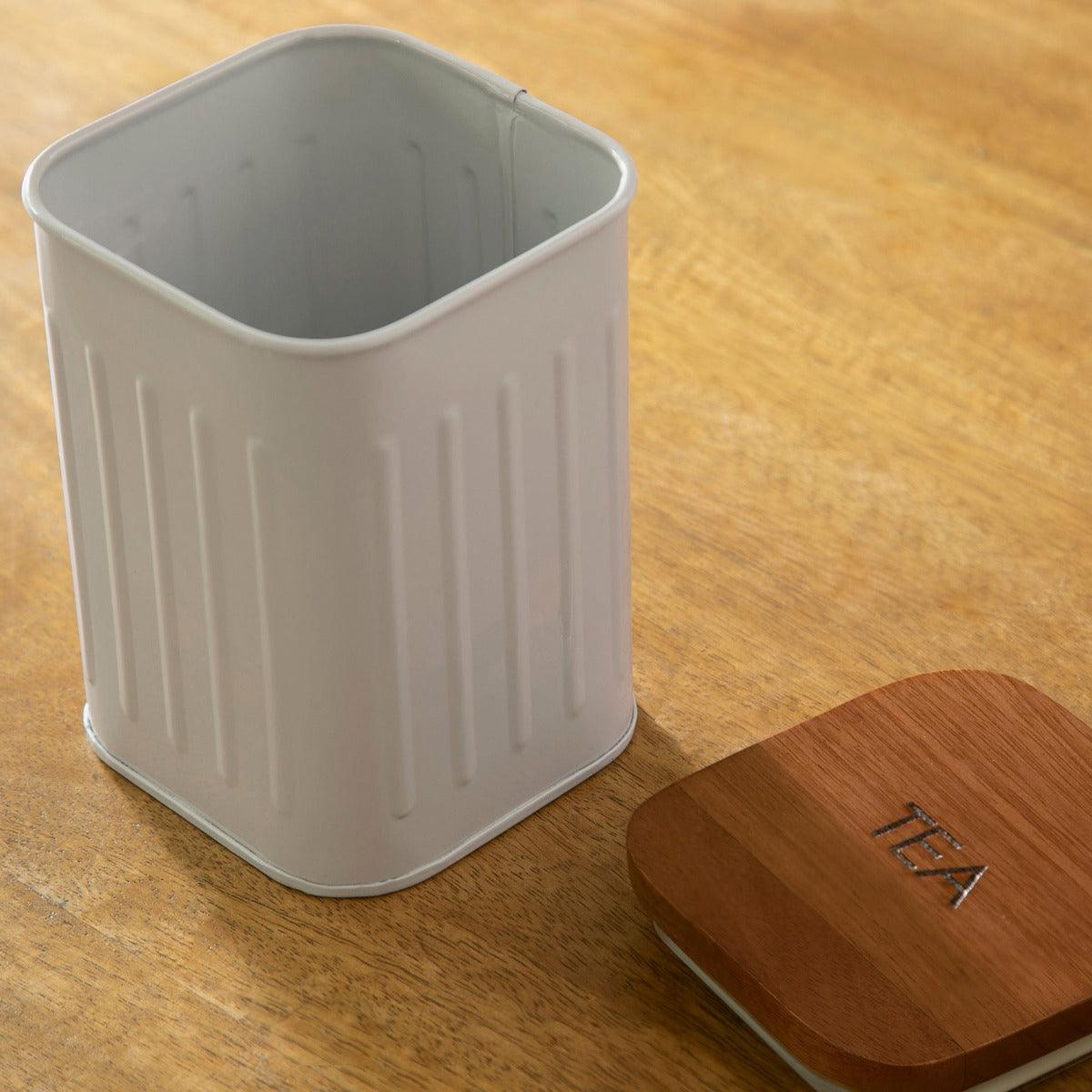 foursquare tea container with wooden lid