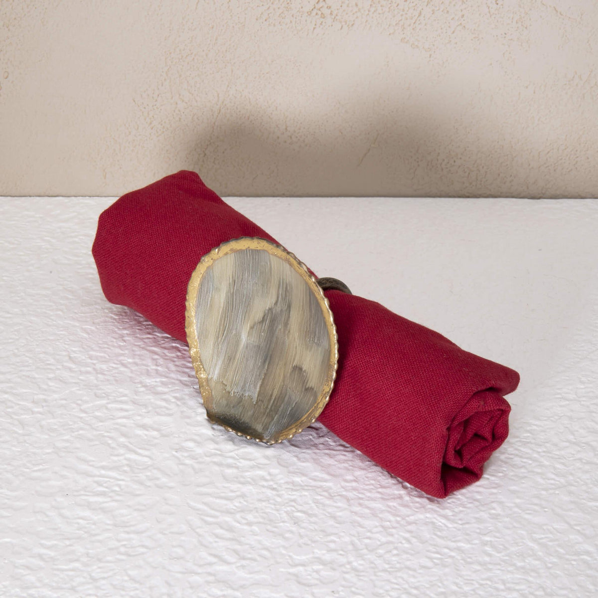 beige round metal napkin ring - ellementry