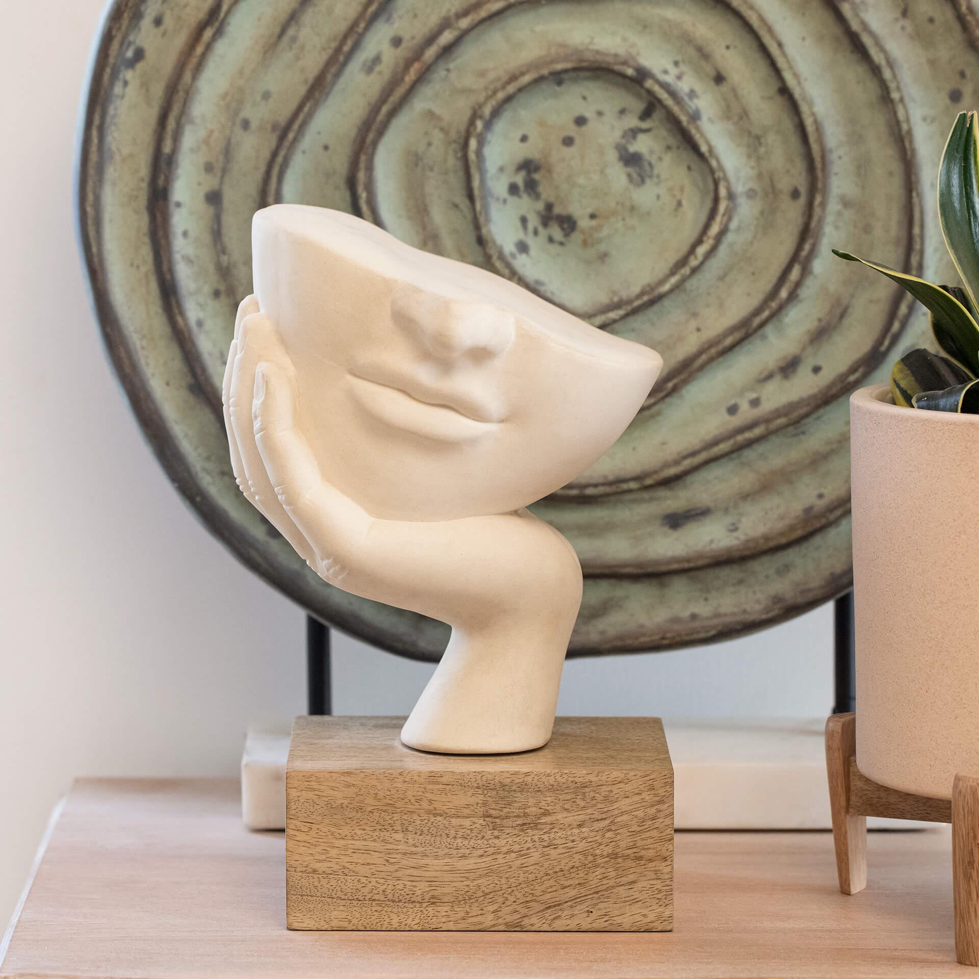 Restive Face Ceramic Sculpture