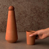 terracotta water bottle with sphere stopper - ellementry