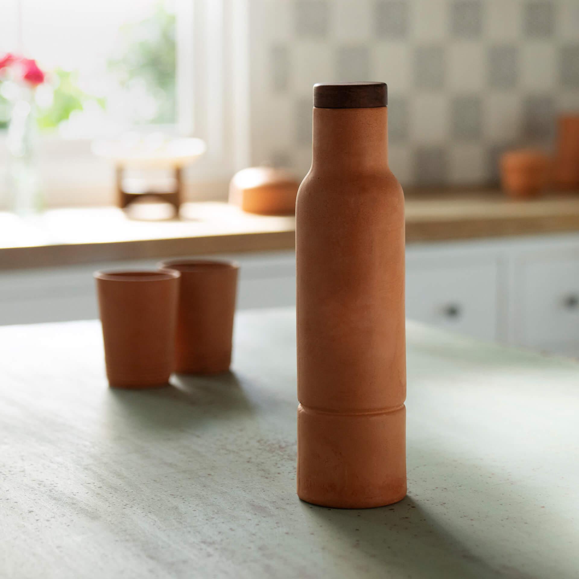 terracotta bottle with wooden lid