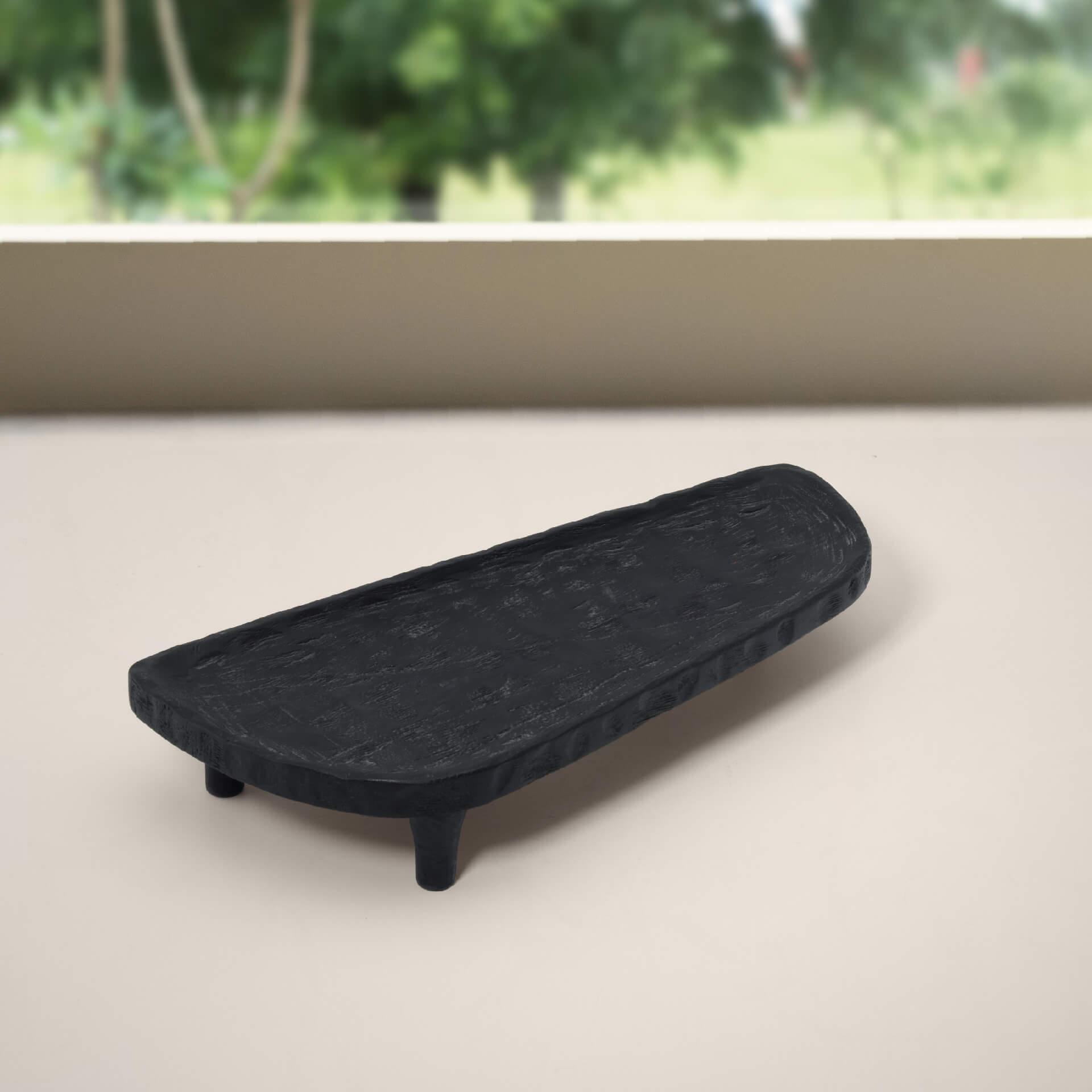 tribal mango wood platter with legs asymmetrical black