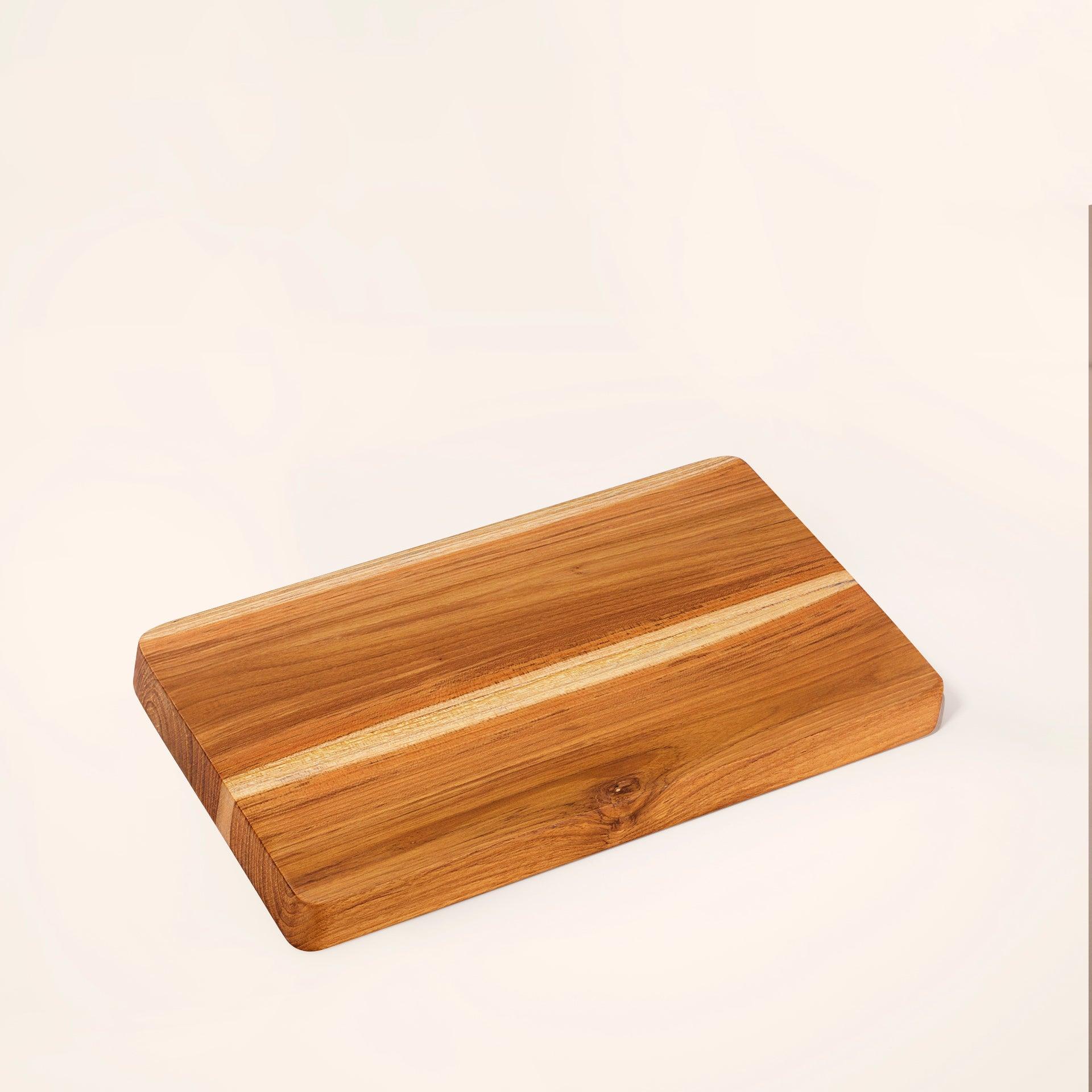 in teak wooden chopping board