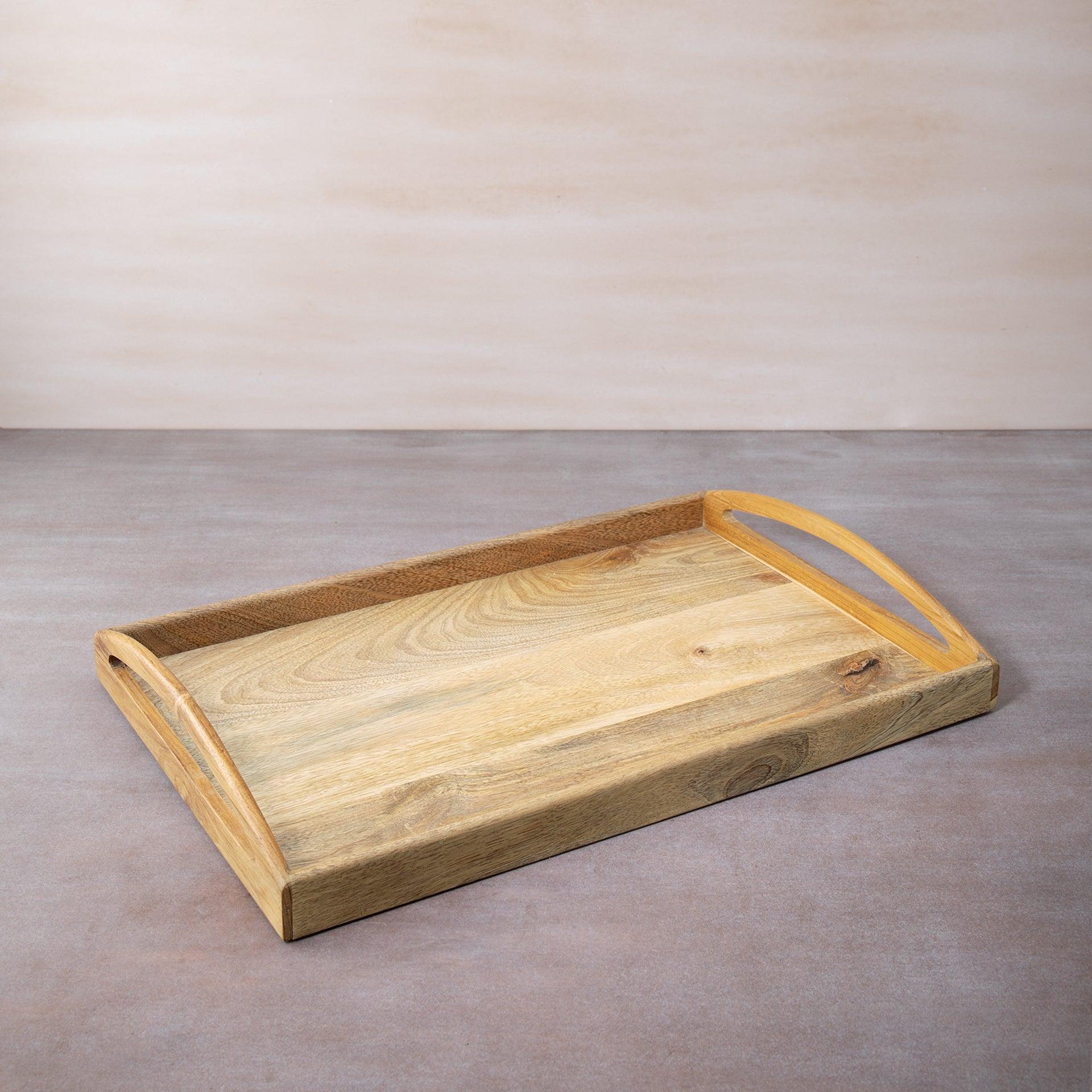 in teak wooden tray